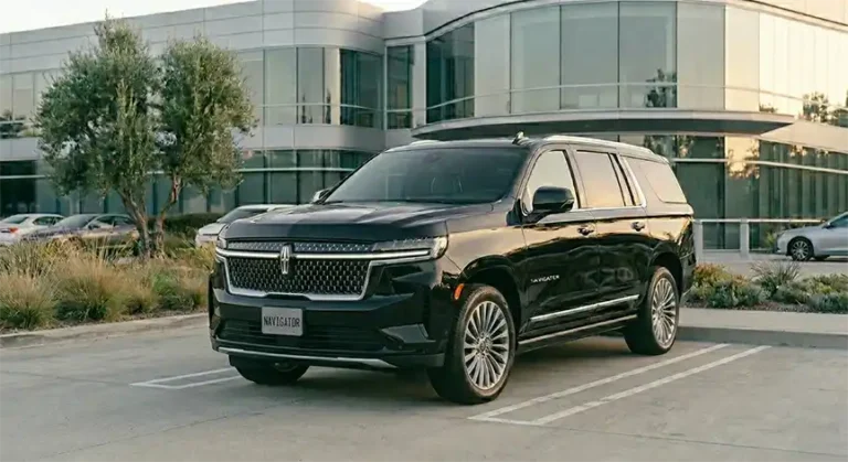 Black Lincoln Navigator from the Apollo executive fleet parked outside a corporate office.